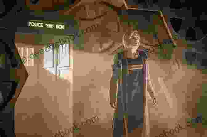 The Thirteenth Doctor, Portrayed By Jodie Whittaker, Standing In Front Of The TARDIS, With A Determined Expression On Her Face. Doctor Who: Thirteenth Doctor S Guide (Dr Who)